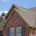 Why don't commercial buildings have slanted roofs?